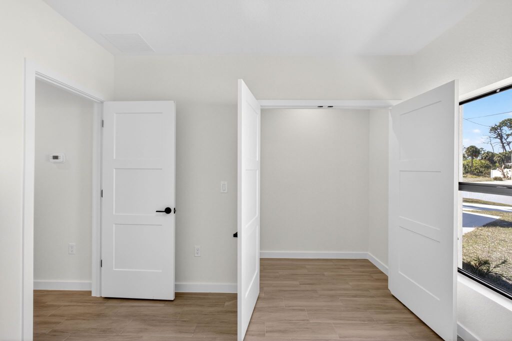 Interior doorways and natural light in a completed AM Homes build