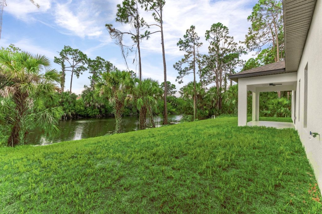 Backyard and canal view from an AM Homes build