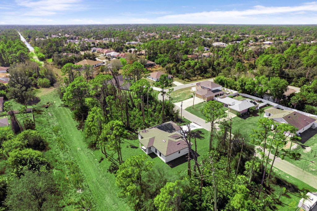 Aerial view of a completed AM Homes build and driveway