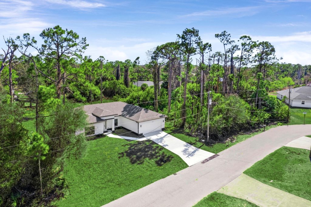Aerial view of an AM Homes build on a corner lot